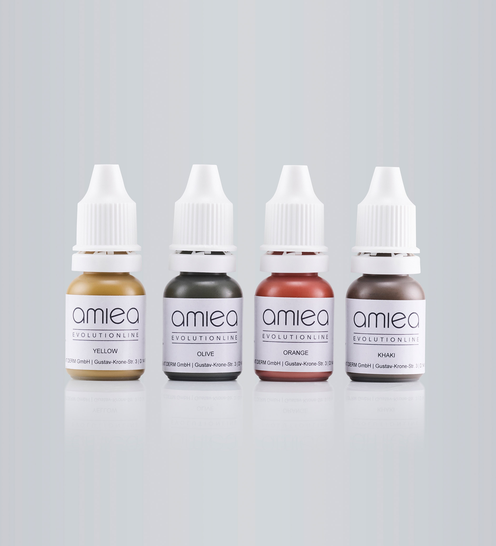 Four bottles with PMU colors of amiea Evolutionline